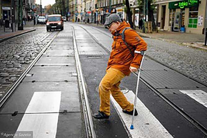 Lukasz Orylski a disabled man since birth, PA user, a father. Holds PhD in political science, is a career counsellor. A disability activist since 2003