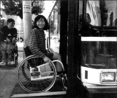 © photo of a bus with a fold-out ramp