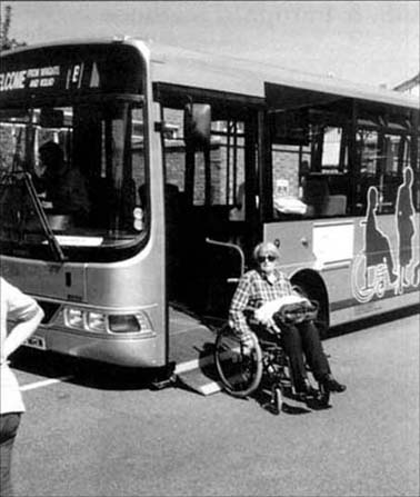 © photo of a bus with a sliding ramp under the floor